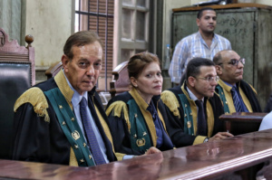 This is Gender image that shows Counselor Fatima Qandil as she stares directly into the lens, seated among her male colleagues on the bench of Egypt’s Criminal Court. Her expression is steady, composed, unflinching. She is the first woman to ascend this platform, a space long reserved for men. Her presence marks a symbolic rupture in a system where the highest levels of law and justice have been overwhelmingly defined by male authority. Yet it also underscores how exceptional women’s inclusion remains, reminding us that representation, while significant, is only the beginning of structural change.